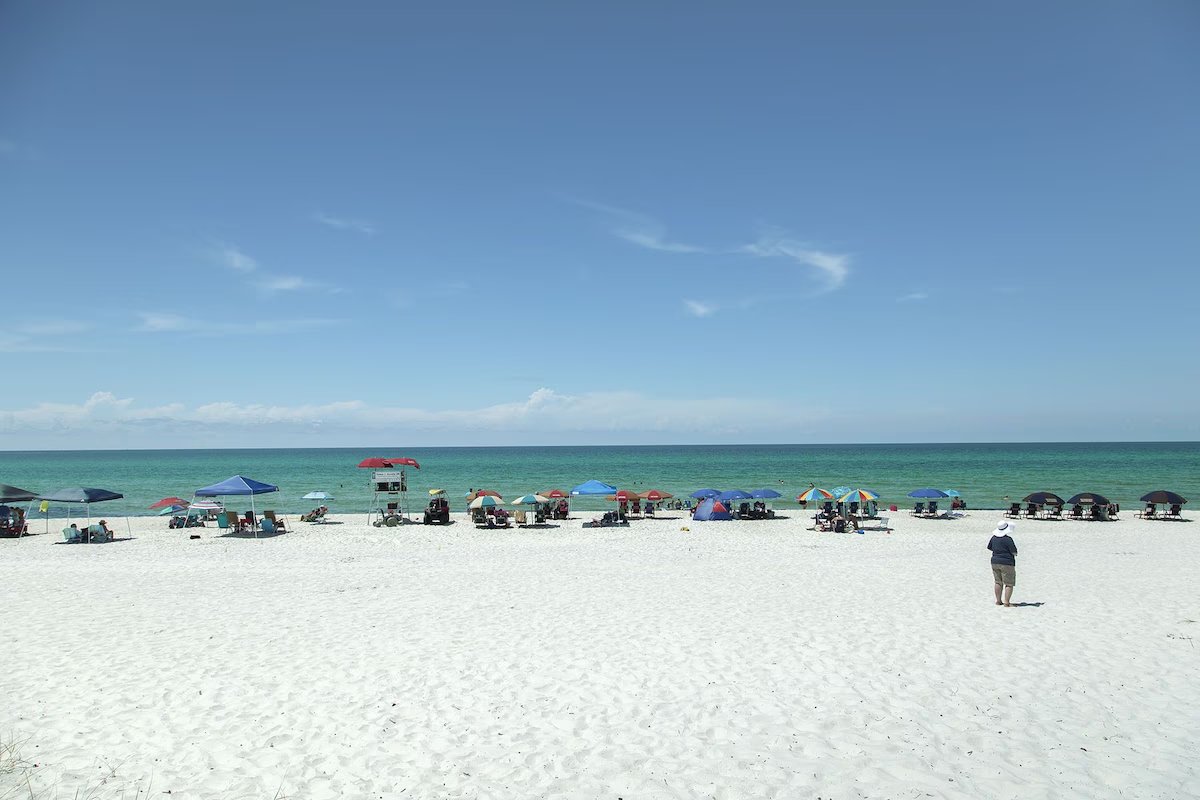 White sand and emerald water at Inlet Beach